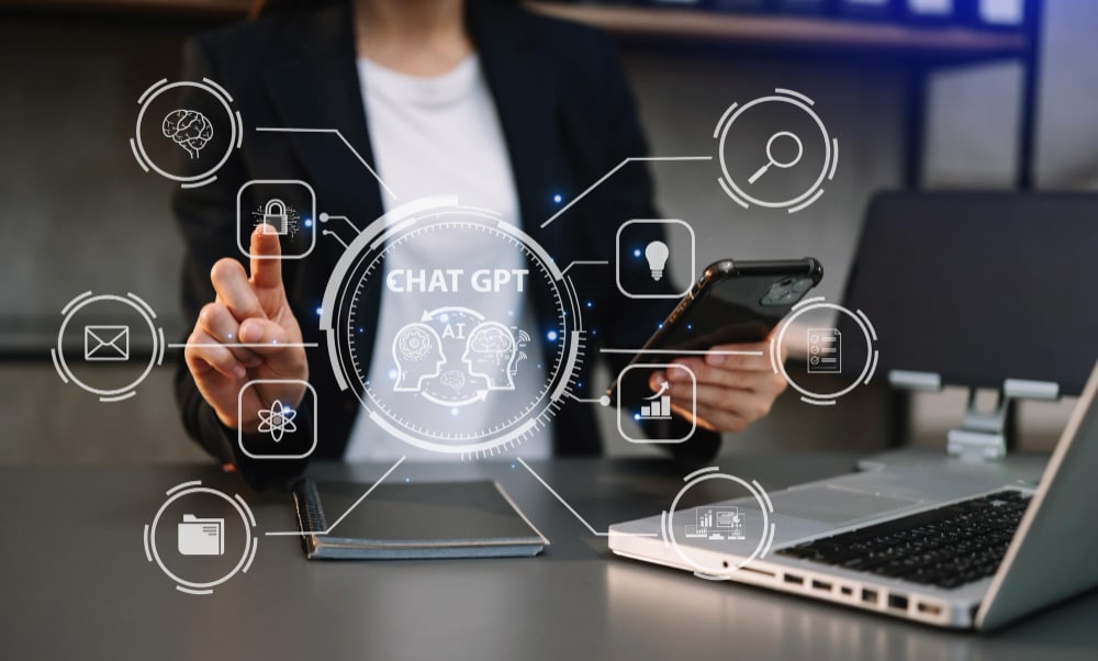 An executive assistant using AI tools on a laptop to manage a founder's inbox, calendar and tasks