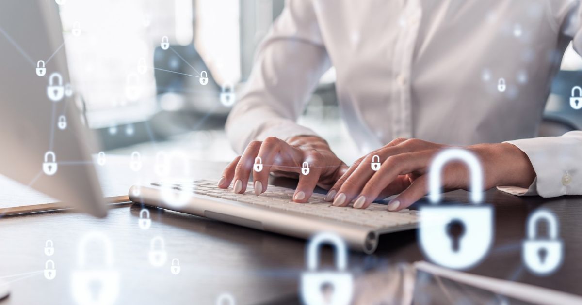 An executive assistant working with secure data on a computer