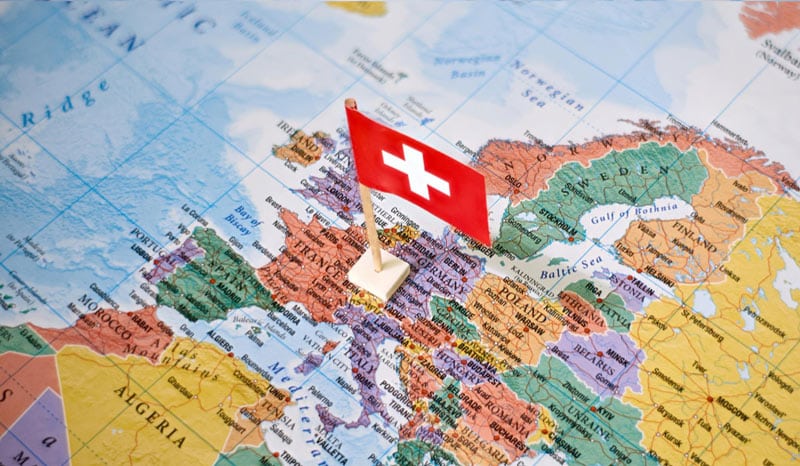 Switzerland map showing EA salary and employer cost variation by canton